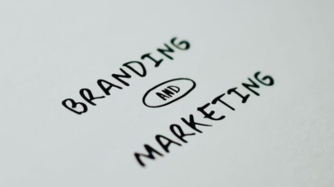 Minimalistic design showcasing 'branding and marketing' text for business strategy visuals.